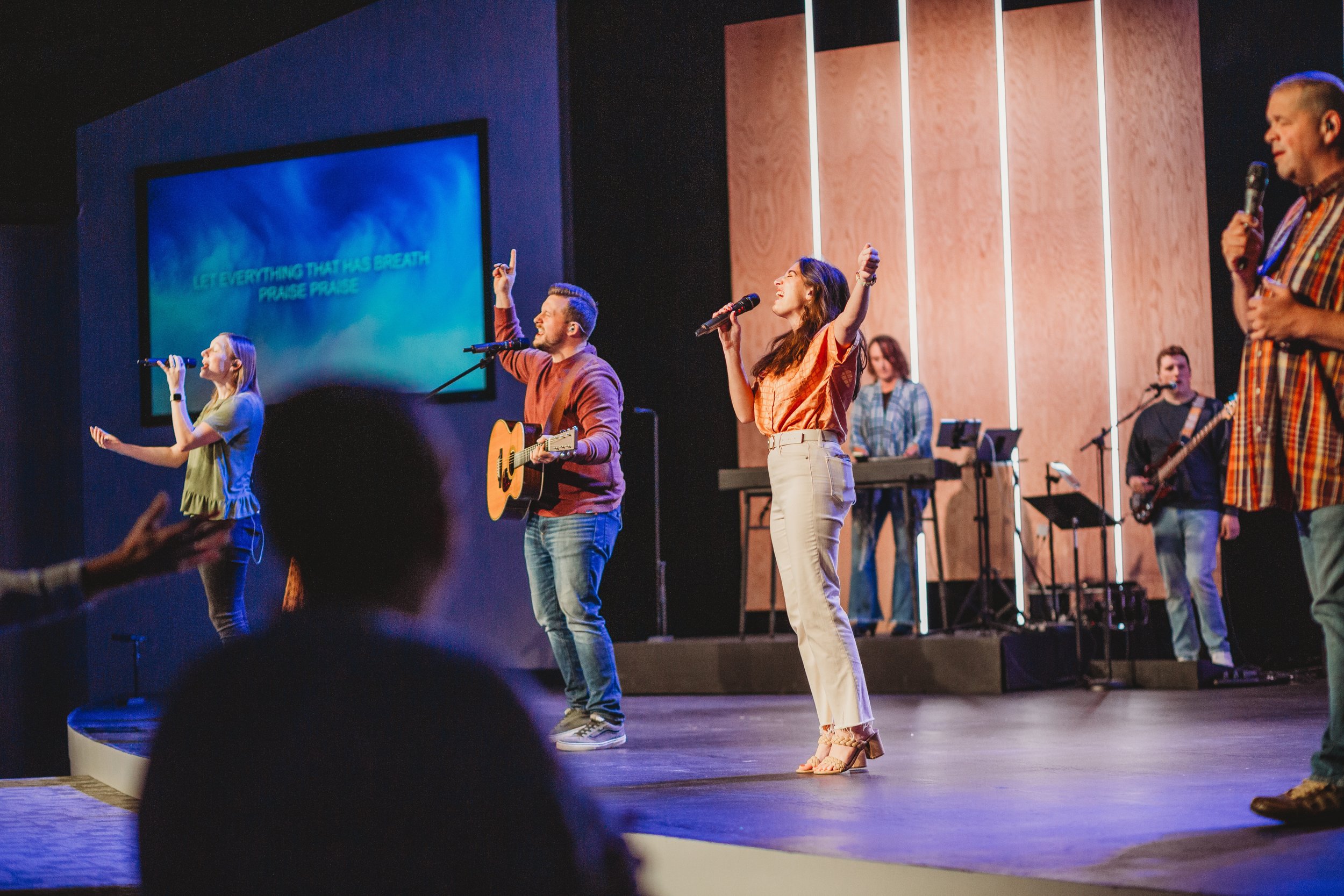 Musicians leading a community worship gathering